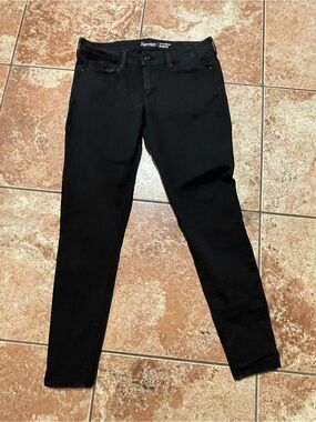 Black low rise skinny jeans from Levi's: size 14L 32x34